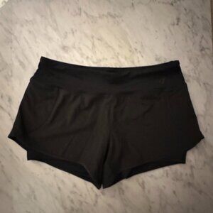 Asics 2 in 1 black running shorts